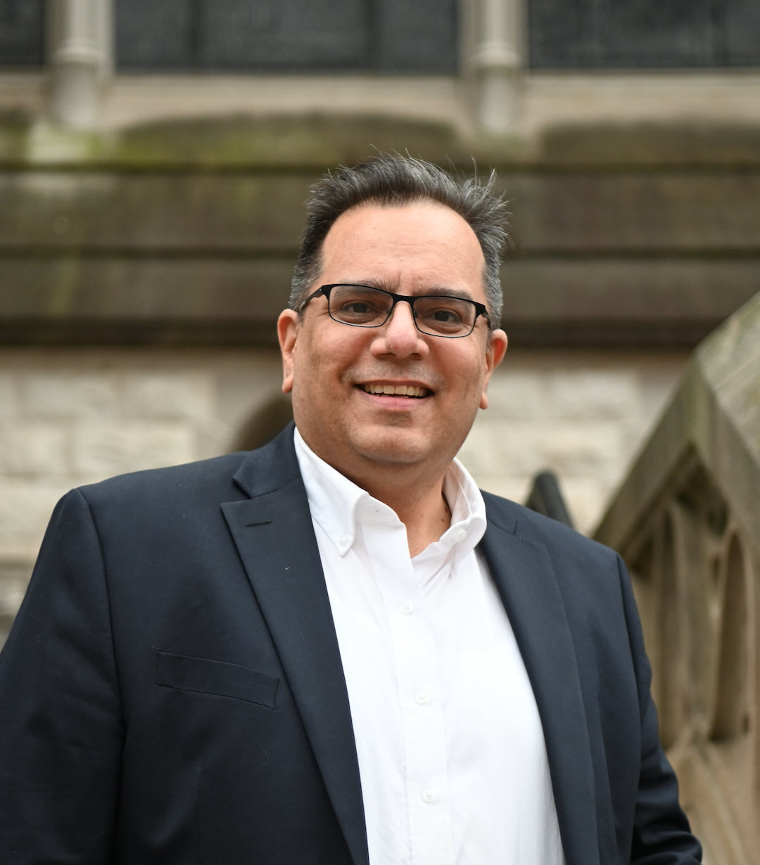 Headshot of Rubén Rosario Rodríguez